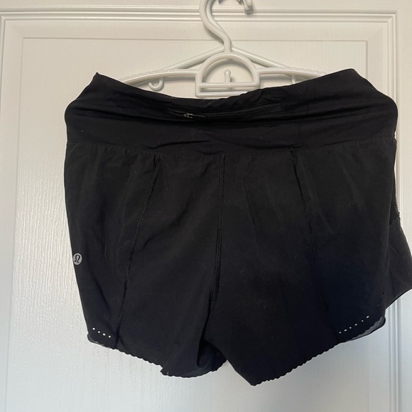 Black 2.5” lululemon running shorts - Picture 2 of 3